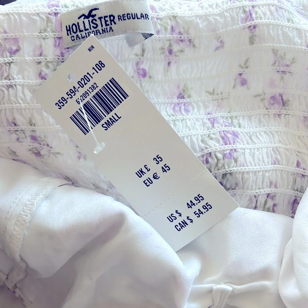 Hollister Floral Print Wrap Front Romper in White/Purple, NWT, Size S